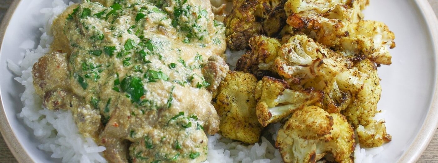 Coriander and yoghurt chicken with fragrant cauliflower an... / Riverford