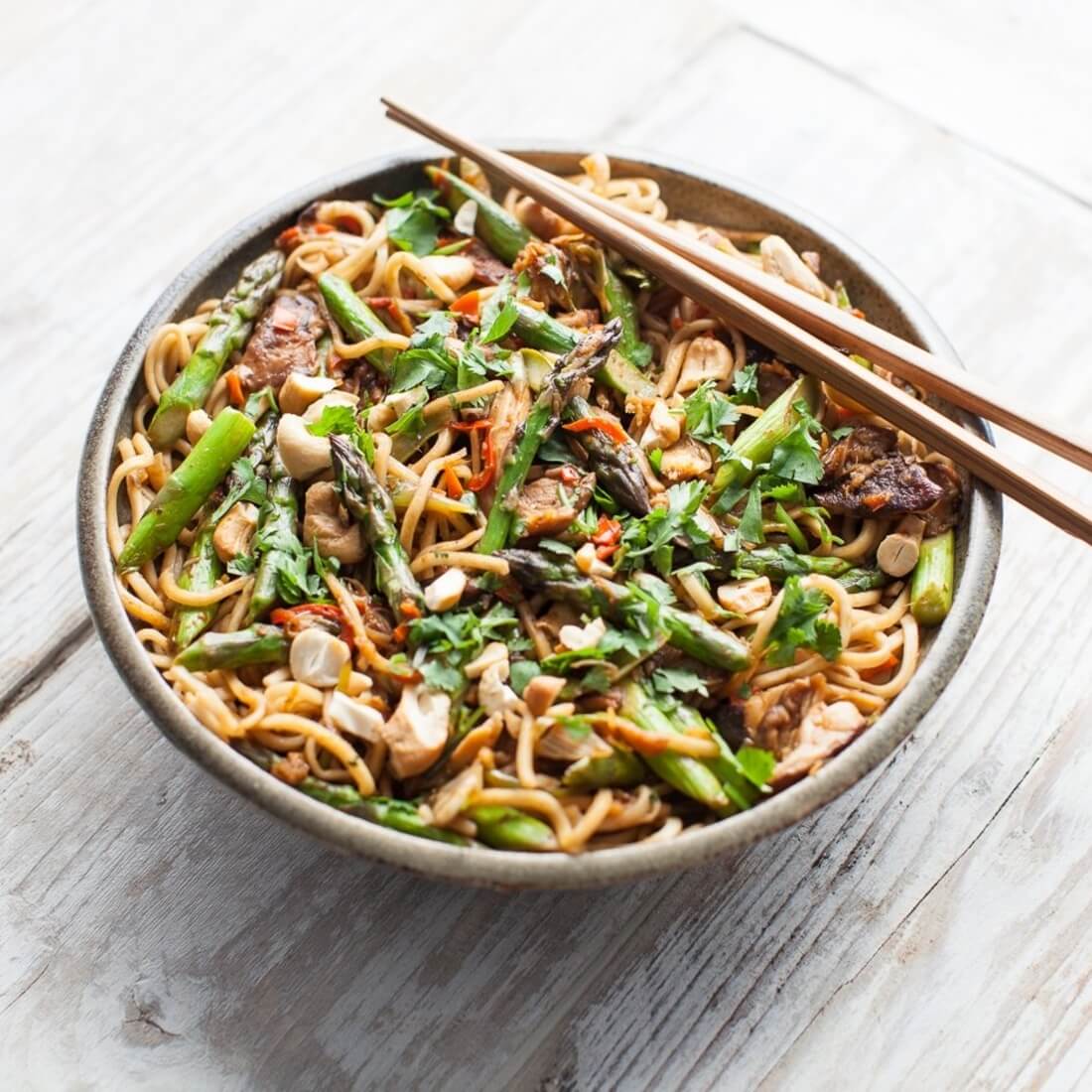 Asparagus and Portobello noodles with spring onions and ca... / Riverford