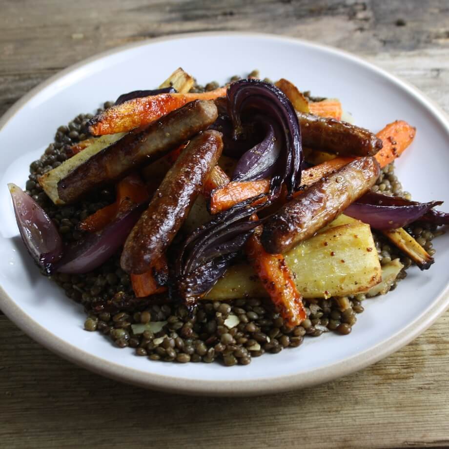 Oven baked sausages with roasted garlic, parsnip and potat... / Riverford