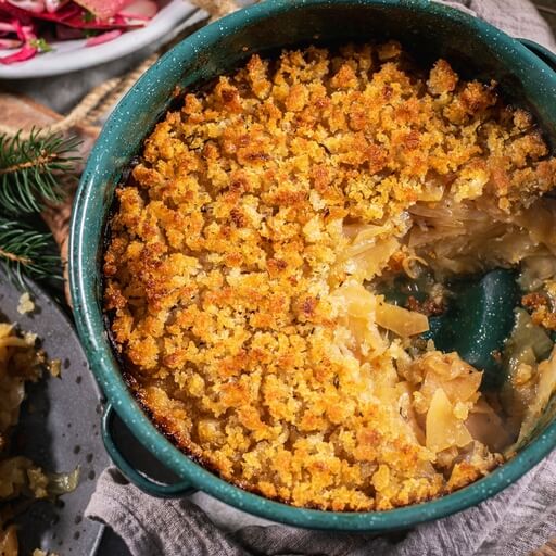 Swede, leek and apple bake with mustard mash and crunchy w… / Riverford