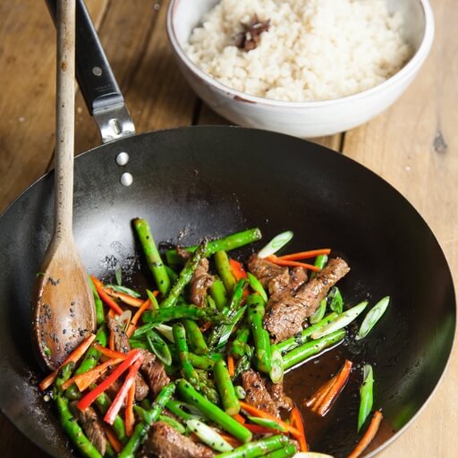 Beef, asparagus and green bean stir fry with orange, honey... / Riverford
