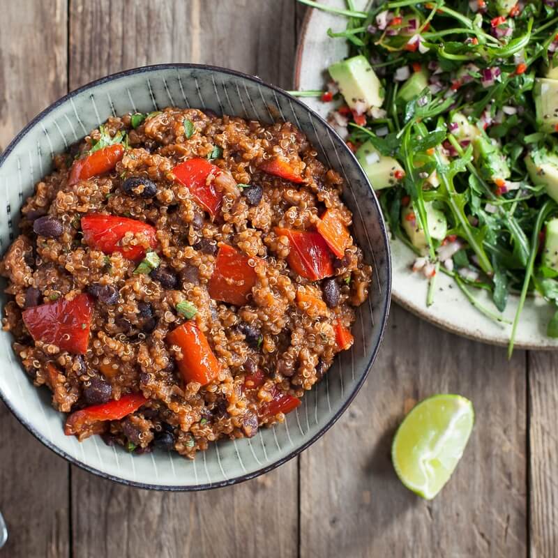 Black bean and quinoa chilli with avocado salad recipe / Riverford