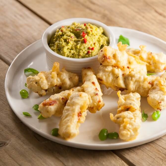 Mint marinated and battered halloumi with spicy broad bean... / Riverford