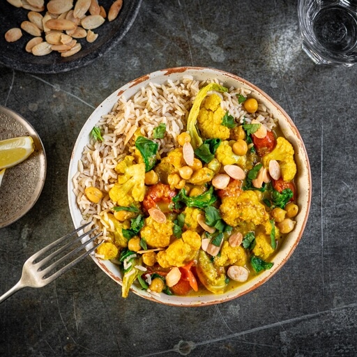 Cauliflower, coconut & spinach curry recipe / Riverford