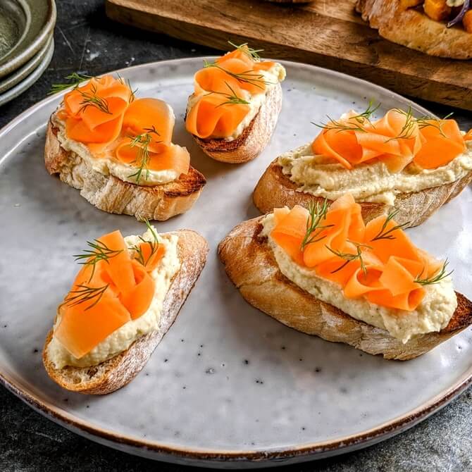 Parsnip & white bean hummus pincho with pickled carrot / Riverford