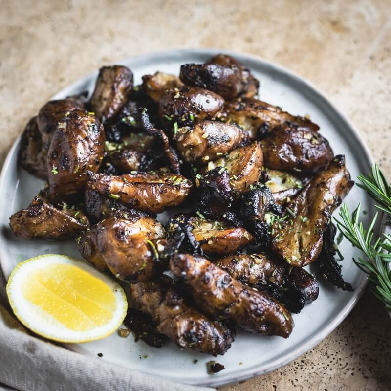 Roasted Jerusalem artichokes with mushrooms & rosemary / Riverford