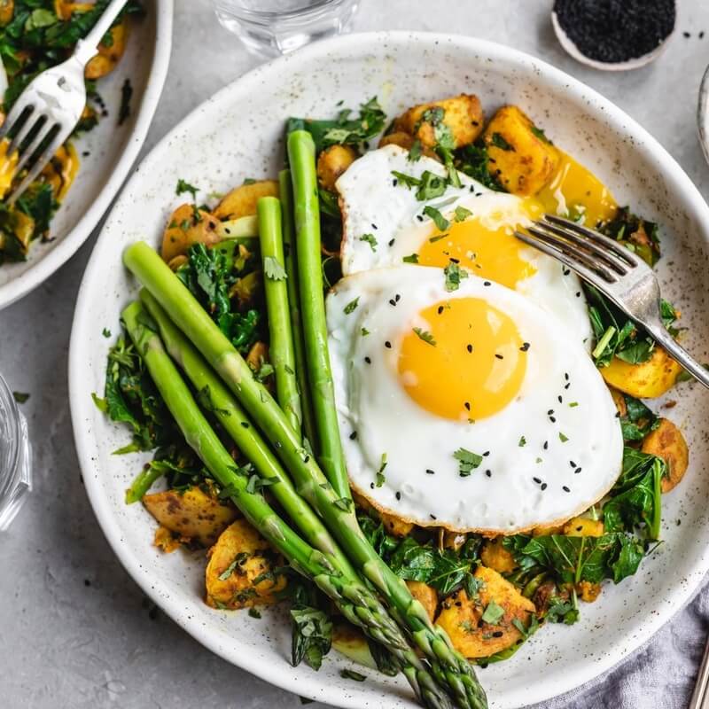Curried hash with asparagus & eggs recipe / Riverford