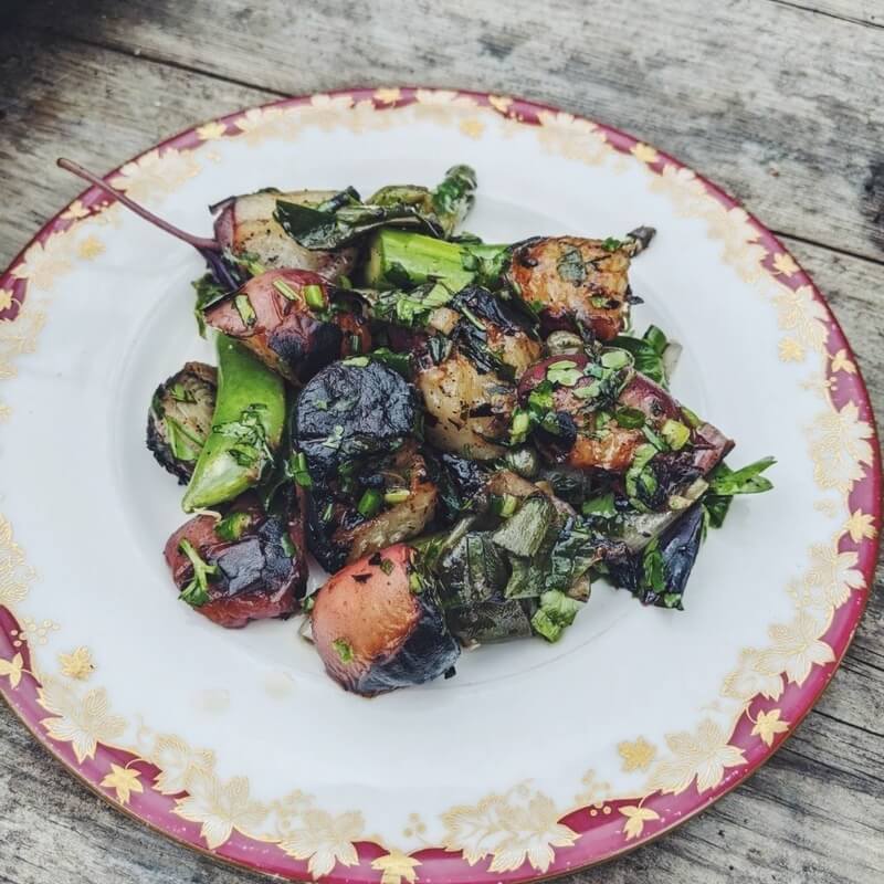 Grilled leeks, peaches & polytunnel herbs recipe / Riverford