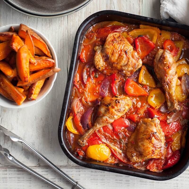 Piripiri chicken legs with tomatoes, peppers & sweet pota... / Riverford