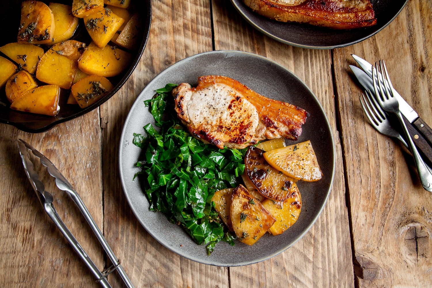 Pork steaks with herb and honey pan-roasted swede, mustard... / Riverford