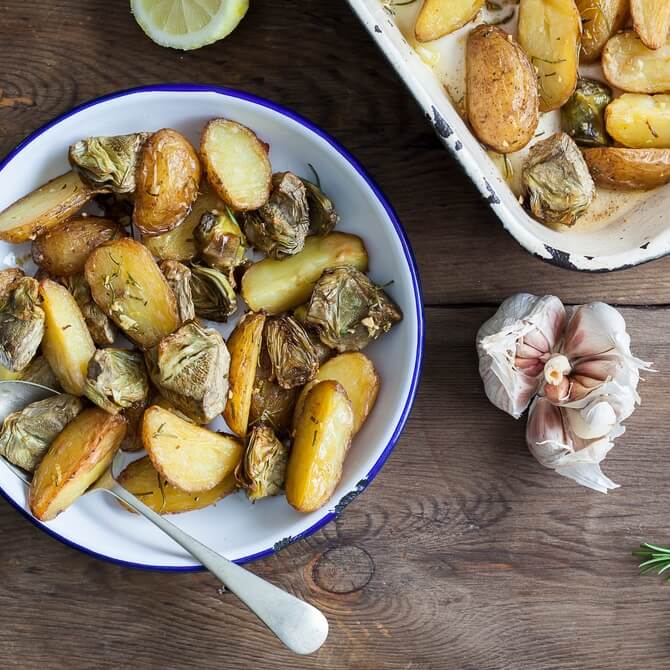 Roast new potatoes and artichokes with rosemary and lemon / Riverford