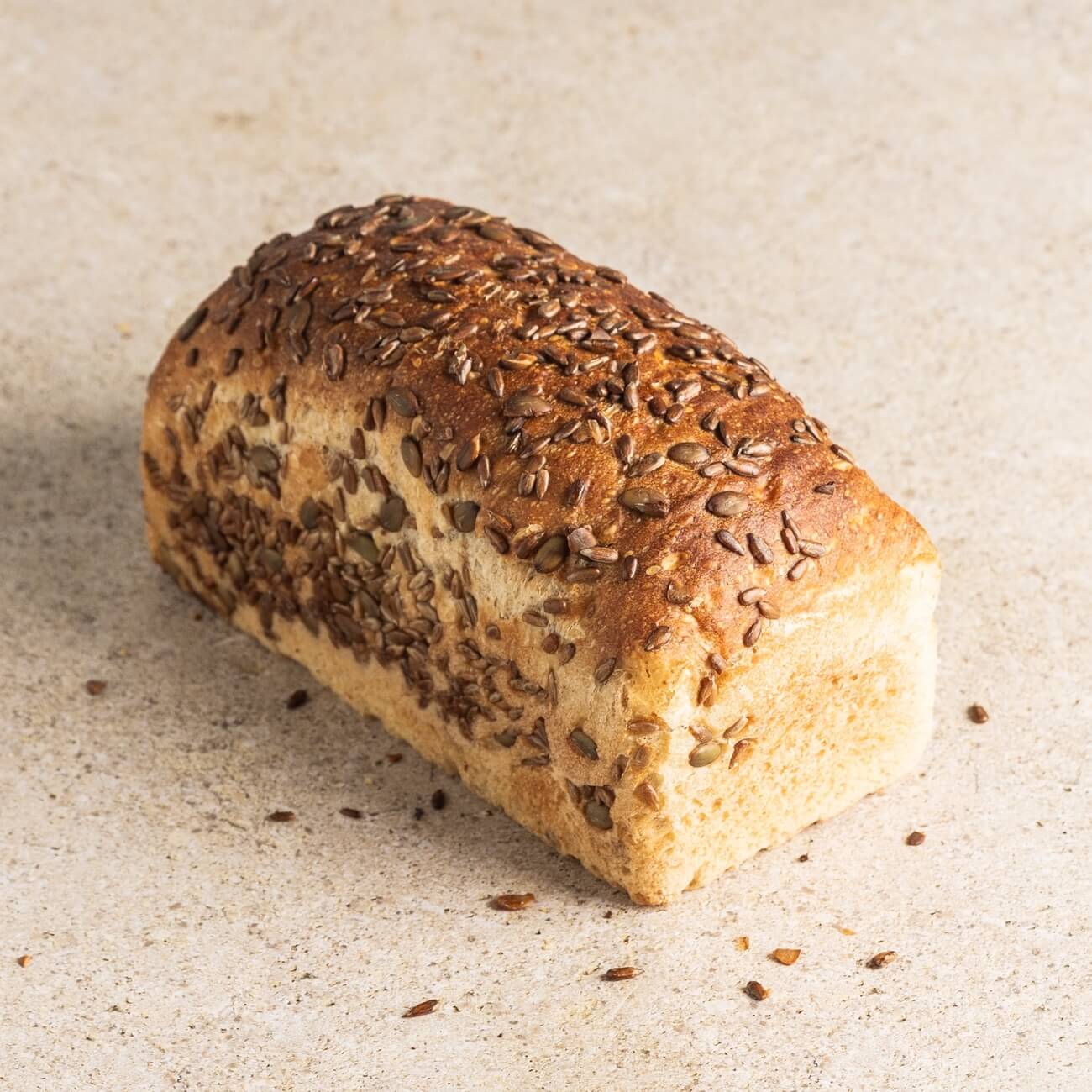 Seed-topped sourdough bread
