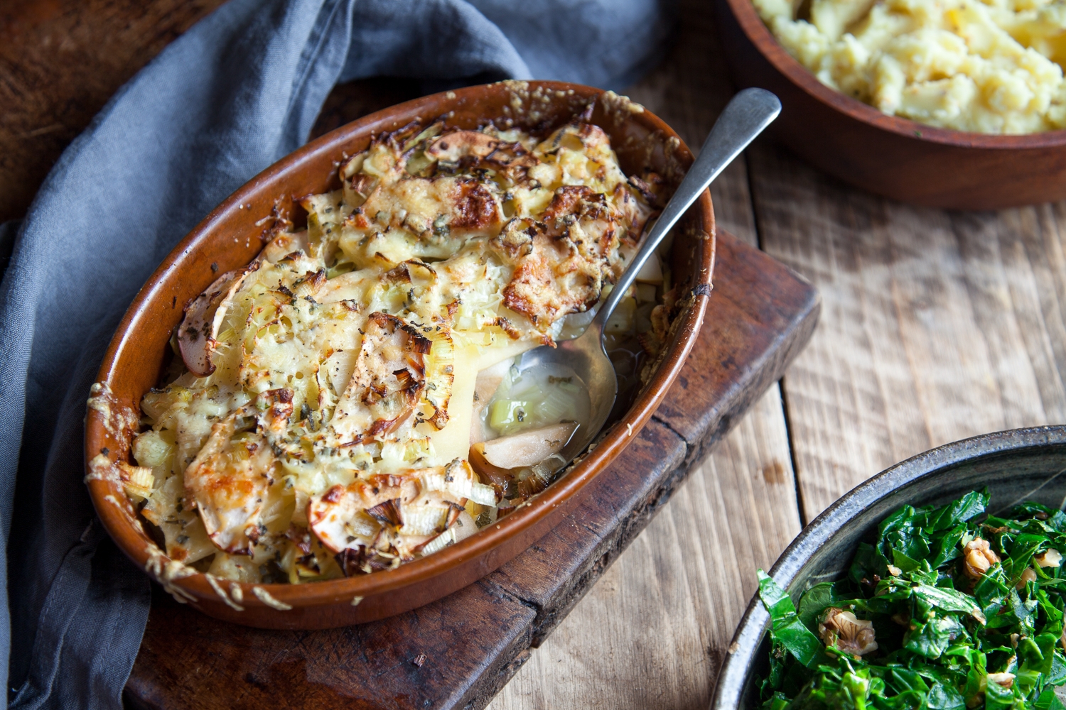 Swede, leek & apple bake with mustard mash & crunchy walnu... / Riverford