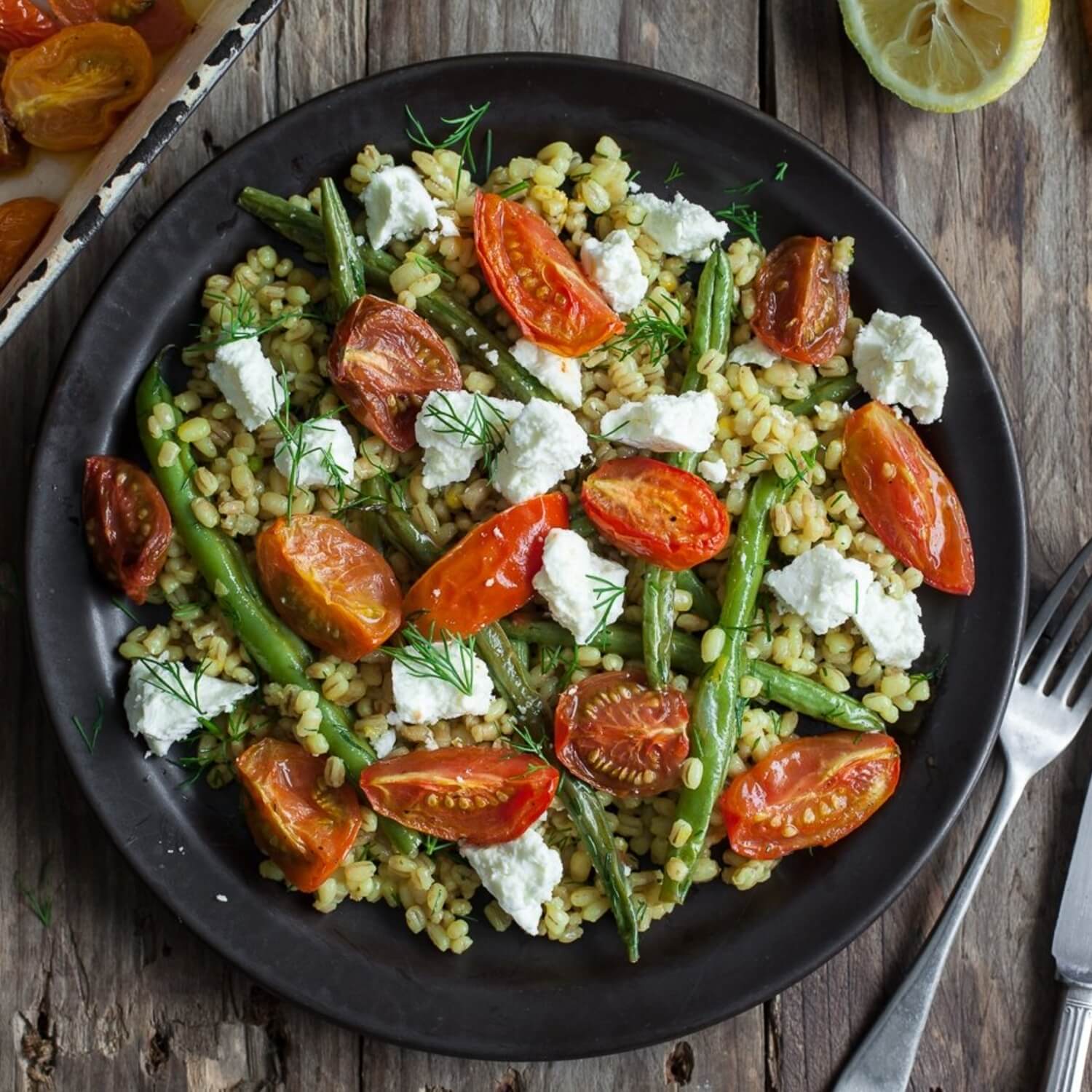 Tomato and barley pilaf with roast green beans and sheep's... / Riverford
